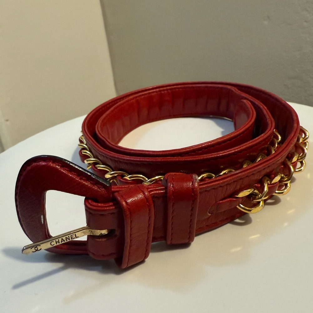 CHANEL Red Belt with Gold Chain Accent